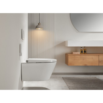 CERANO - Závesná WC misa s integrovaným elektronickým bidetom Cronus Pro, Vortex Rimless 180 ° + UF sedátko - biela lesklá - 59,3x38,4 cm